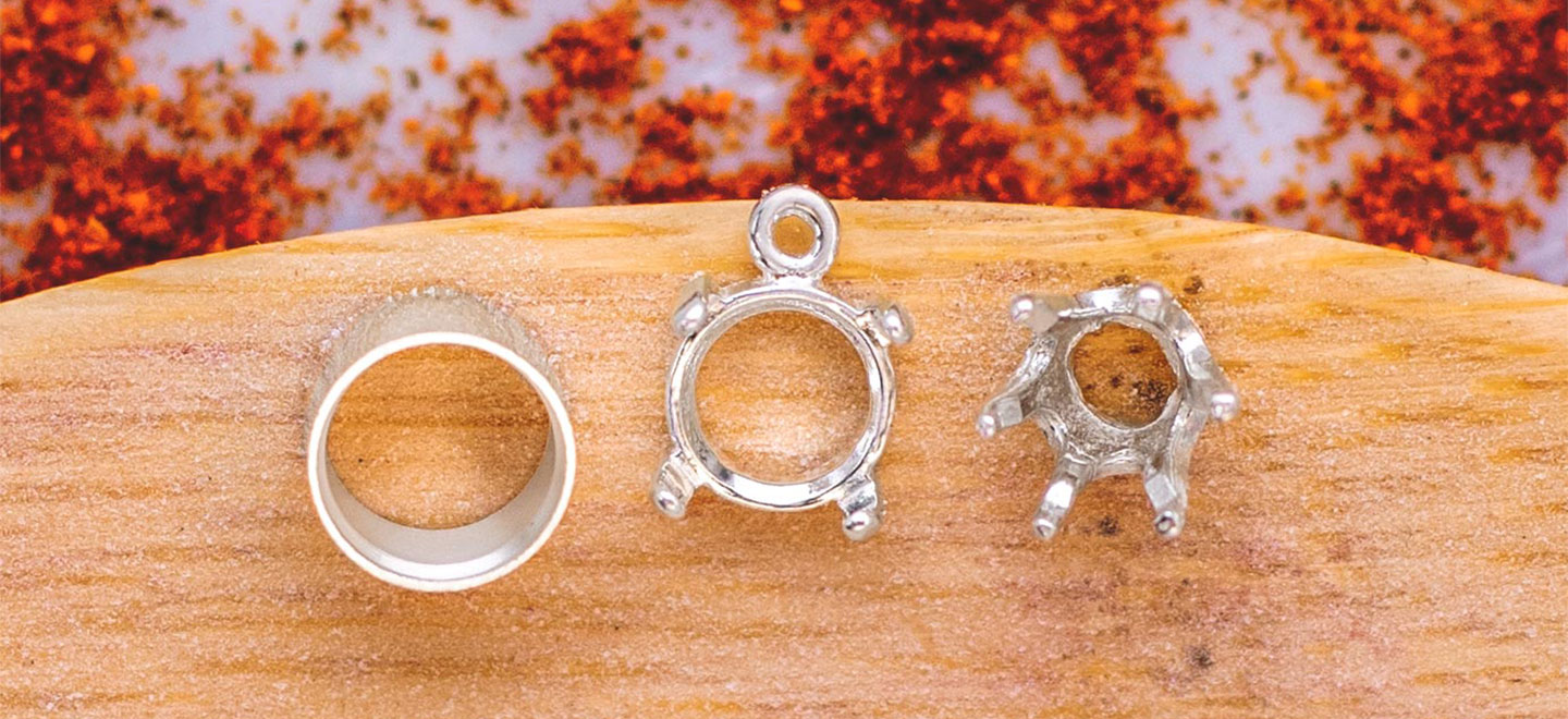 Three different types of jewelry stone settings in sterling silver