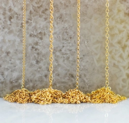Gold-Filled Chain draped on table top