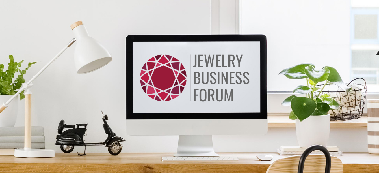 Jewelry Business Forum logo on laptop