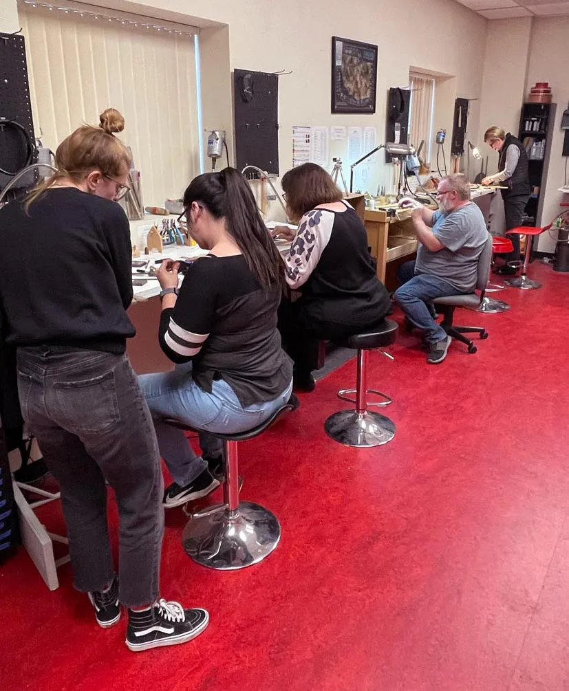 Halstead employees creating jewelry in the studio