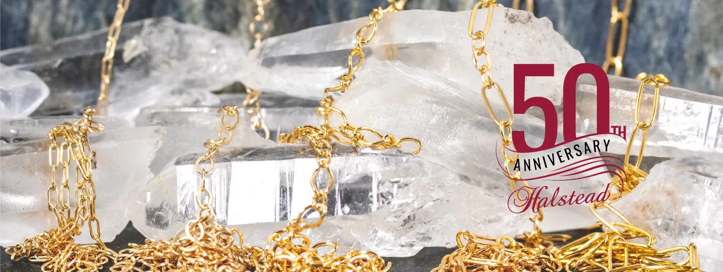 Gold chain on quartz crystals
